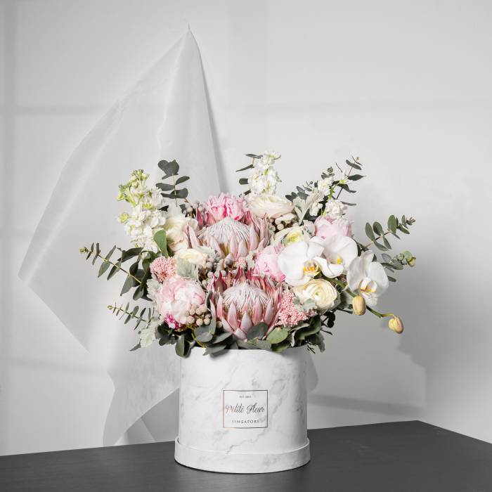 Blush Italian Ranunculus, Queen Protea and Peony in a Box