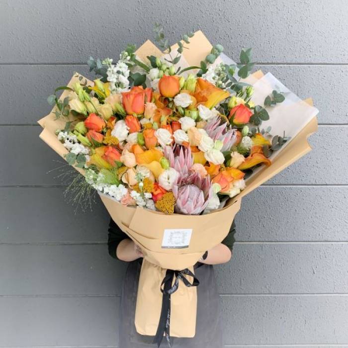 King Protea and Orange Calla Lily Bouquet