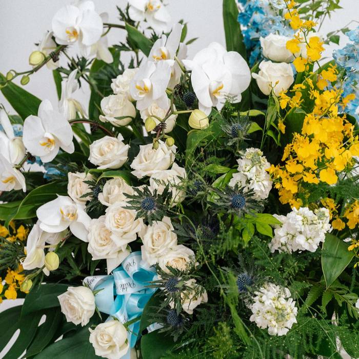 Lush Delphinium and Orchid Floral Stand
