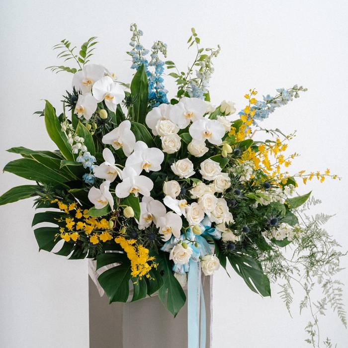 Lush Delphinium and Orchid Floral Stand