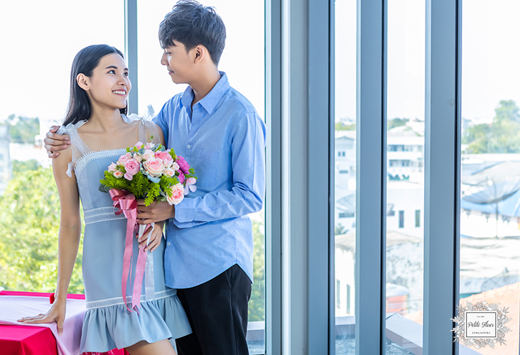 Guy Giving Flowers to his Girlfriend