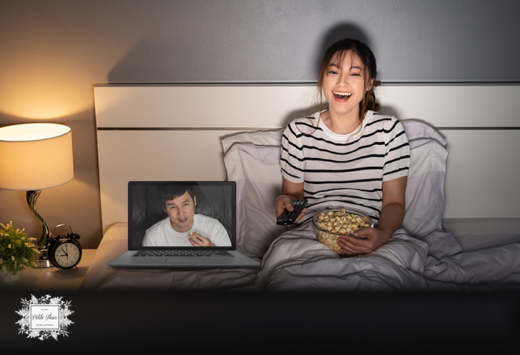 A Female Watching A Movie While Waiting For Her Flowers